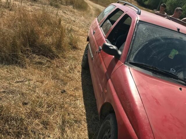 Красный Форд Эскорт, объемом двигателя 1.4 л и пробегом 68 тыс. км за 628 $, фото 5 на Automoto.ua