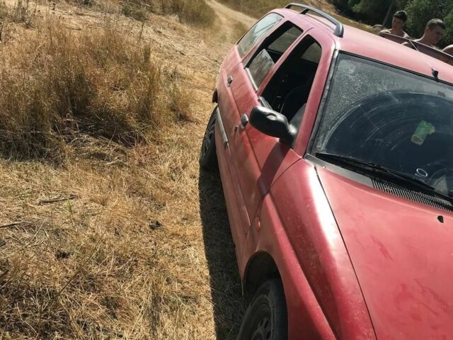 Красный Форд Эскорт, объемом двигателя 1.4 л и пробегом 68 тыс. км за 628 $, фото 4 на Automoto.ua