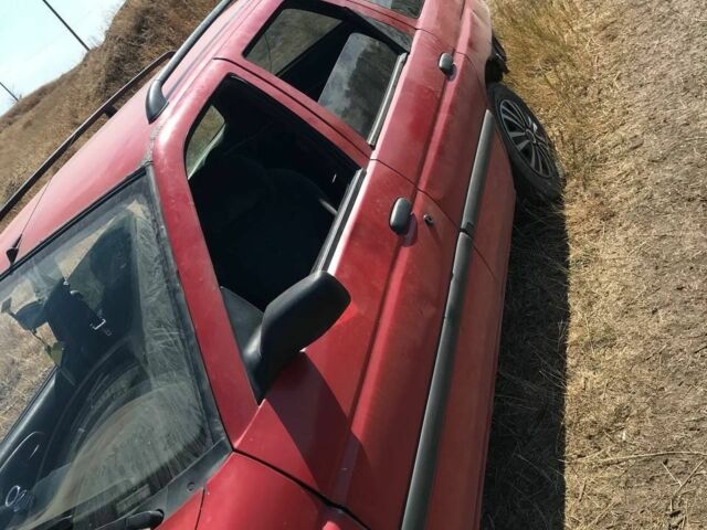 Красный Форд Эскорт, объемом двигателя 1.4 л и пробегом 68 тыс. км за 628 $, фото 6 на Automoto.ua