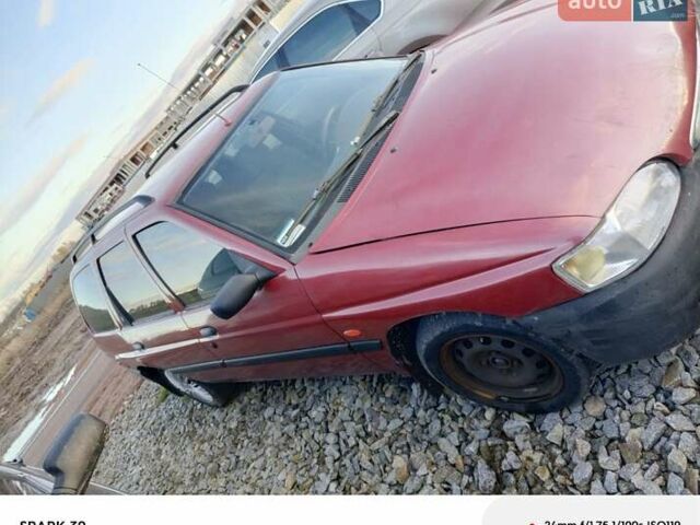 Красный Форд Эскорт, объемом двигателя 1.6 л и пробегом 300 тыс. км за 850 $, фото 3 на Automoto.ua