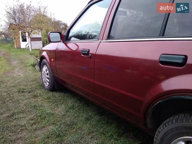 Червоний Форд Ескорт, об'ємом двигуна 1.39 л та пробігом 93 тис. км за 1325 $, фото 24 на Automoto.ua