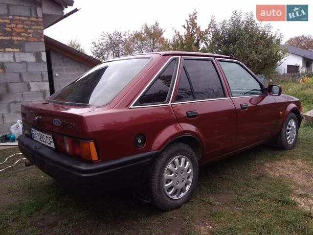 Червоний Форд Ескорт, об'ємом двигуна 1.39 л та пробігом 93 тис. км за 1325 $, фото 35 на Automoto.ua