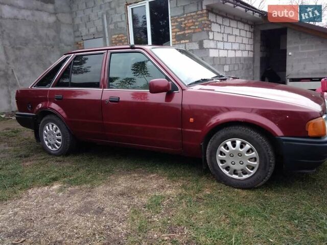 Червоний Форд Ескорт, об'ємом двигуна 1.39 л та пробігом 93 тис. км за 1325 $, фото 16 на Automoto.ua