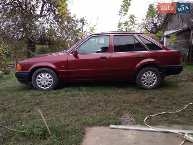 Червоний Форд Ескорт, об'ємом двигуна 1.39 л та пробігом 93 тис. км за 1325 $, фото 29 на Automoto.ua