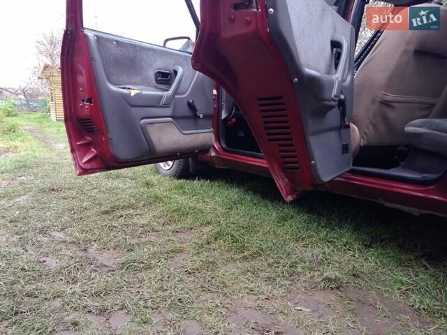 Червоний Форд Ескорт, об'ємом двигуна 1.39 л та пробігом 93 тис. км за 1325 $, фото 11 на Automoto.ua