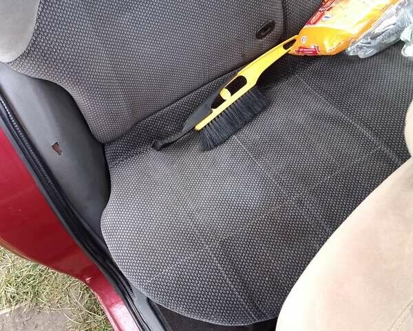 Червоний Форд Ескорт, об'ємом двигуна 1.39 л та пробігом 93 тис. км за 1325 $, фото 3 на Automoto.ua