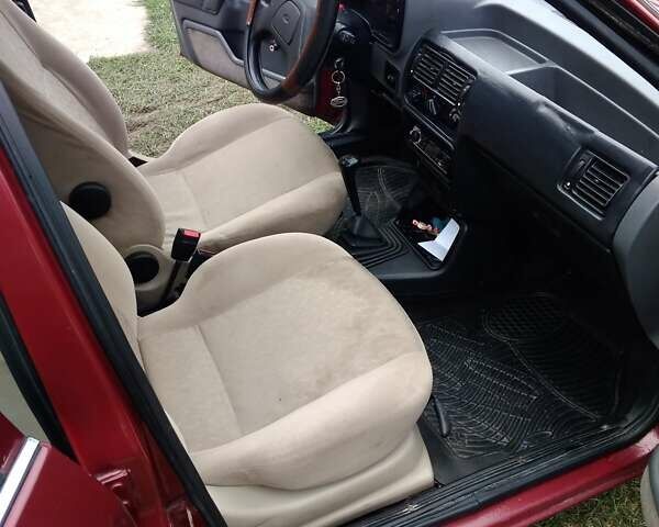 Червоний Форд Ескорт, об'ємом двигуна 1.39 л та пробігом 93 тис. км за 1325 $, фото 37 на Automoto.ua