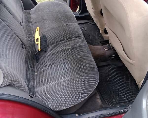 Червоний Форд Ескорт, об'ємом двигуна 1.39 л та пробігом 93 тис. км за 1325 $, фото 2 на Automoto.ua