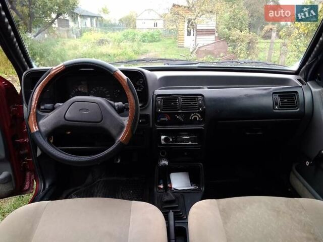 Червоний Форд Ескорт, об'ємом двигуна 1.39 л та пробігом 93 тис. км за 1325 $, фото 10 на Automoto.ua