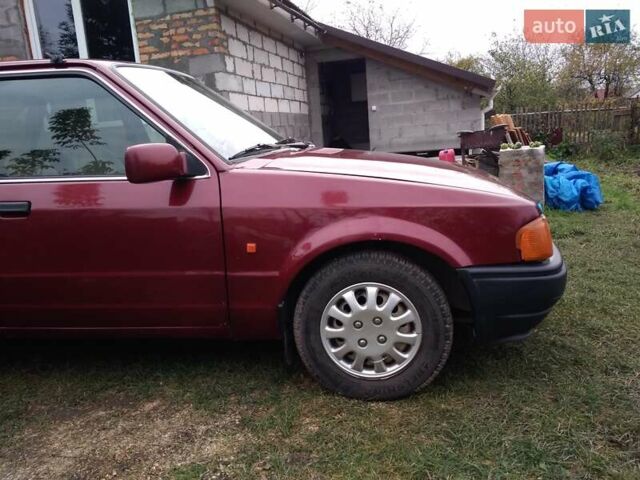 Червоний Форд Ескорт, об'ємом двигуна 1.39 л та пробігом 93 тис. км за 1325 $, фото 17 на Automoto.ua