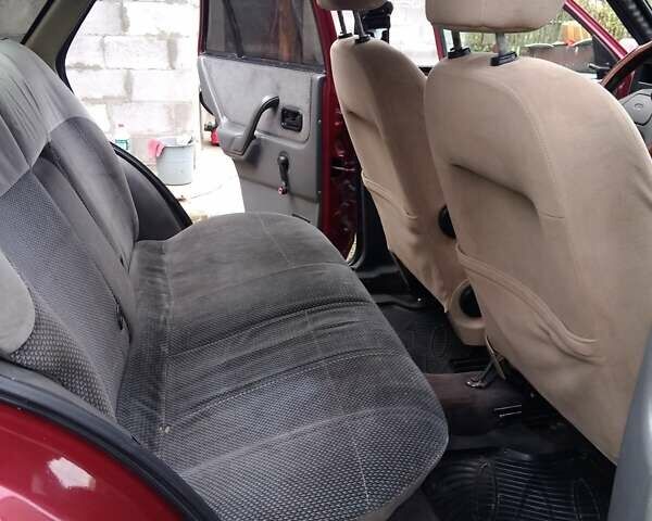 Червоний Форд Ескорт, об'ємом двигуна 1.39 л та пробігом 93 тис. км за 1325 $, фото 1 на Automoto.ua