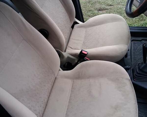 Червоний Форд Ескорт, об'ємом двигуна 1.39 л та пробігом 93 тис. км за 1325 $, фото 4 на Automoto.ua