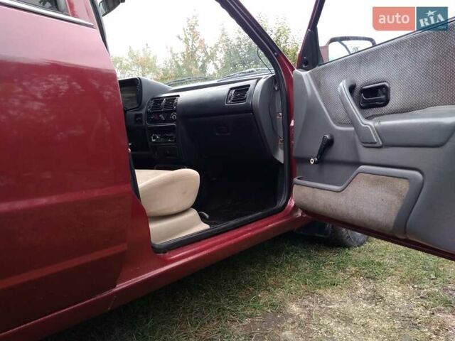 Червоний Форд Ескорт, об'ємом двигуна 1.39 л та пробігом 93 тис. км за 1325 $, фото 6 на Automoto.ua