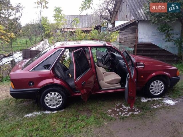 Червоний Форд Ескорт, об'ємом двигуна 1.39 л та пробігом 93 тис. км за 1325 $, фото 39 на Automoto.ua
