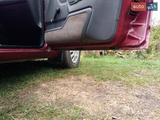 Червоний Форд Ескорт, об'ємом двигуна 1.39 л та пробігом 93 тис. км за 1325 $, фото 7 на Automoto.ua