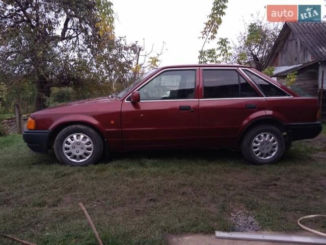 Червоний Форд Ескорт, об'ємом двигуна 1.39 л та пробігом 93 тис. км за 1325 $, фото 19 на Automoto.ua