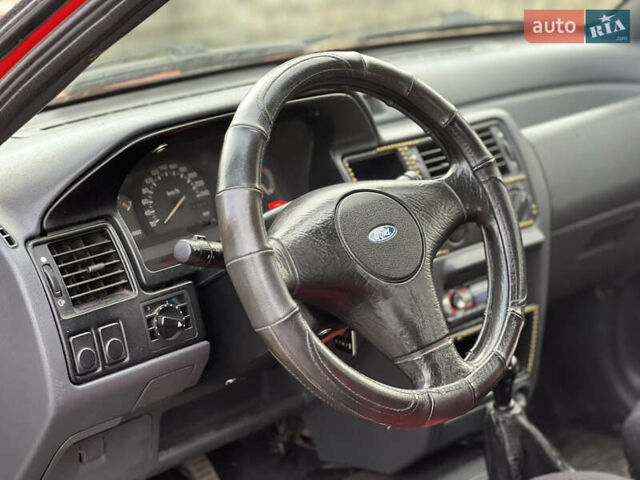 Красный Форд Эскорт, объемом двигателя 1.3 л и пробегом 76 тыс. км за 1000 $, фото 4 на Automoto.ua