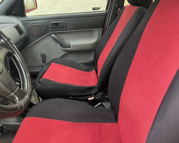 Красный Форд Эскорт, объемом двигателя 1.3 л и пробегом 76 тыс. км за 1000 $, фото 9 на Automoto.ua