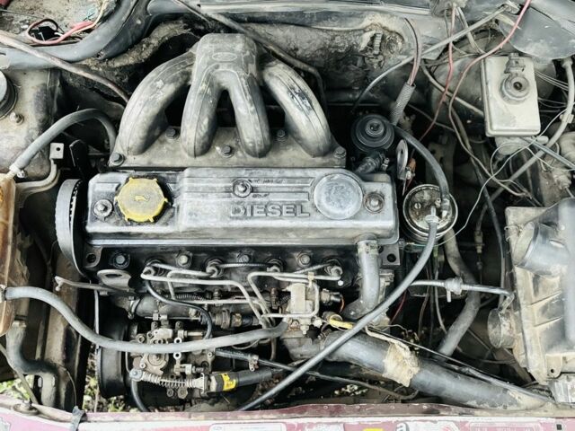 Красный Форд Эскорт, объемом двигателя 1.8 л и пробегом 111 тыс. км за 600 $, фото 5 на Automoto.ua