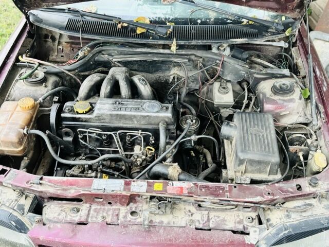 Красный Форд Эскорт, объемом двигателя 1.8 л и пробегом 111 тыс. км за 600 $, фото 4 на Automoto.ua