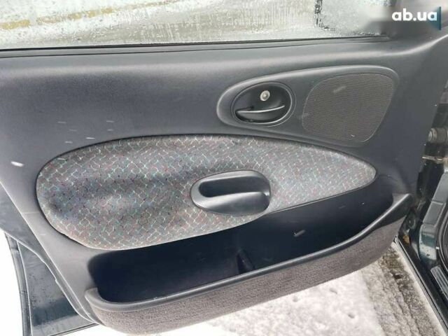 Форд Ескорт, об'ємом двигуна 1.4 л та пробігом 400 тис. км за 1999 $, фото 9 на Automoto.ua