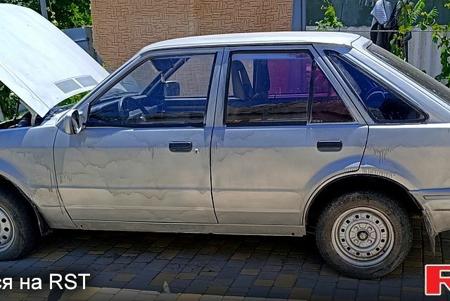 Серый Форд Эскорт, объемом двигателя 1.6 л и пробегом 100 тыс. км за 600 $, фото 2 на Automoto.ua