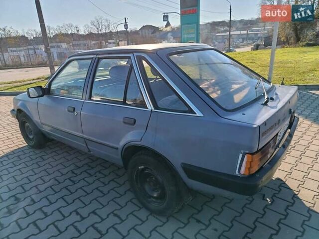 Серый Форд Эскорт, объемом двигателя 1.6 л и пробегом 320 тыс. км за 1500 $, фото 1 на Automoto.ua