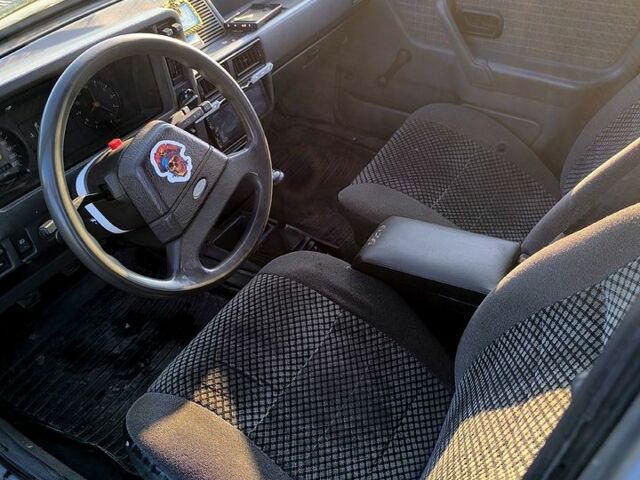 Серый Форд Эскорт, объемом двигателя 1.3 л и пробегом 250 тыс. км за 600 $, фото 2 на Automoto.ua