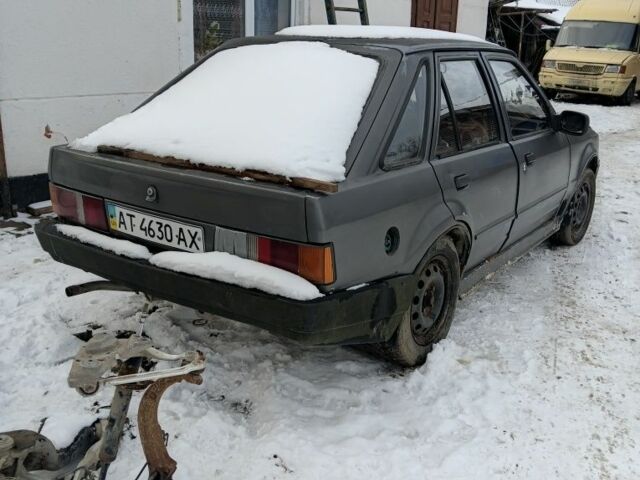 Серый Форд Эскорт, объемом двигателя 1.3 л и пробегом 200 тыс. км за 300 $, фото 3 на Automoto.ua