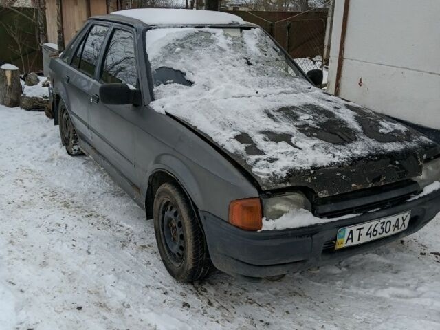 Серый Форд Эскорт, объемом двигателя 1.3 л и пробегом 200 тыс. км за 300 $, фото 1 на Automoto.ua