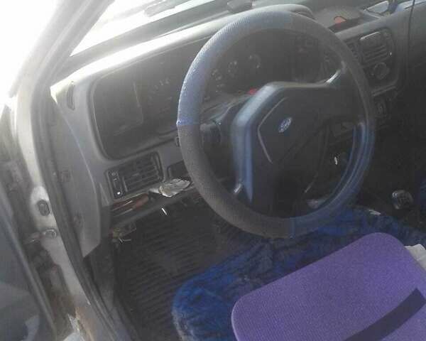 Сірий Форд Ескорт, об'ємом двигуна 1.4 л та пробігом 134 тис. км за 600 $, фото 4 на Automoto.ua