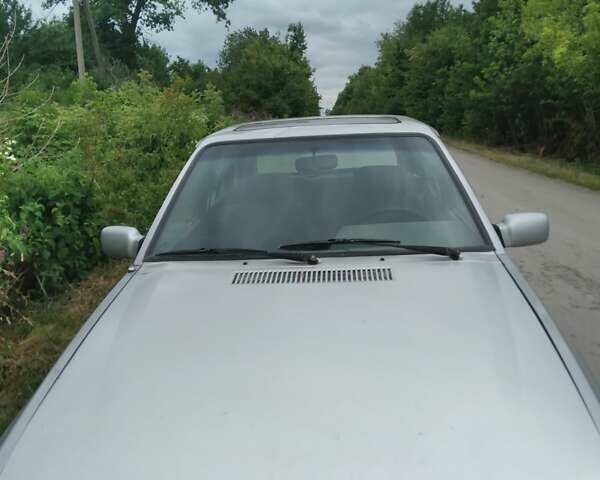 Сірий Форд Ескорт, об'ємом двигуна 1.3 л та пробігом 197 тис. км за 900 $, фото 1 на Automoto.ua