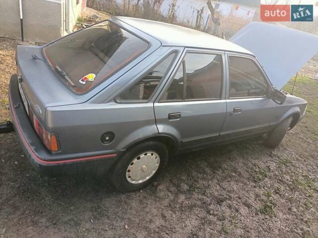Серый Форд Эскорт, объемом двигателя 1.3 л и пробегом 100 тыс. км за 850 $, фото 10 на Automoto.ua