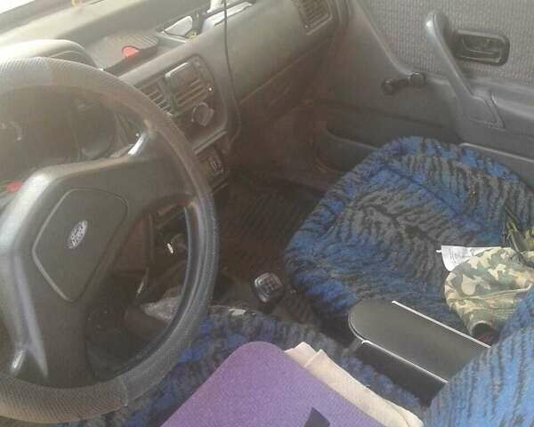 Сірий Форд Ескорт, об'ємом двигуна 1.4 л та пробігом 134 тис. км за 600 $, фото 1 на Automoto.ua