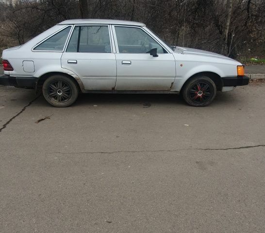 Серый Форд Эскорт, объемом двигателя 1.6 л и пробегом 435 тыс. км за 559 $, фото 5 на Automoto.ua