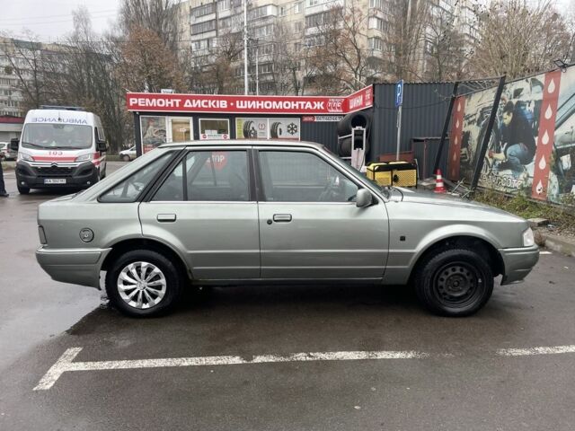 Серый Форд Эскорт, объемом двигателя 1.3 л и пробегом 333 тыс. км за 1000 $, фото 4 на Automoto.ua