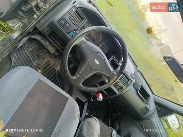 Серый Форд Эскорт, объемом двигателя 1.8 л и пробегом 320 тыс. км за 850 $, фото 1 на Automoto.ua