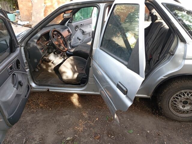 Серый Форд Эскорт, объемом двигателя 1.6 л и пробегом 38 тыс. км за 680 $, фото 4 на Automoto.ua