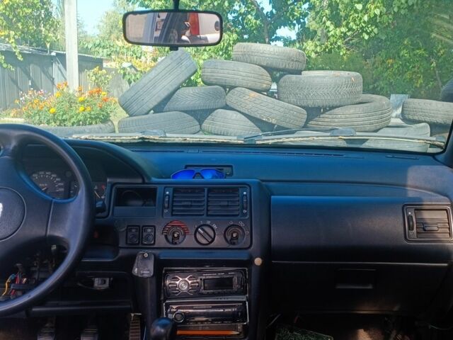 Сірий Форд Ескорт, об'ємом двигуна 1.4 л та пробігом 134 тис. км за 727 $, фото 5 на Automoto.ua