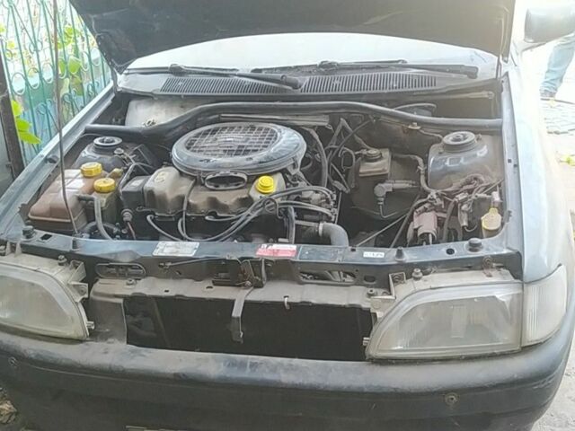 Серый Форд Эскорт, объемом двигателя 1.4 л и пробегом 300 тыс. км за 358 $, фото 5 на Automoto.ua