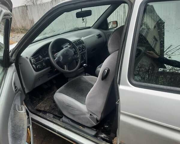 Сірий Форд Ескорт, об'ємом двигуна 1.4 л та пробігом 250 тис. км за 950 $, фото 3 на Automoto.ua