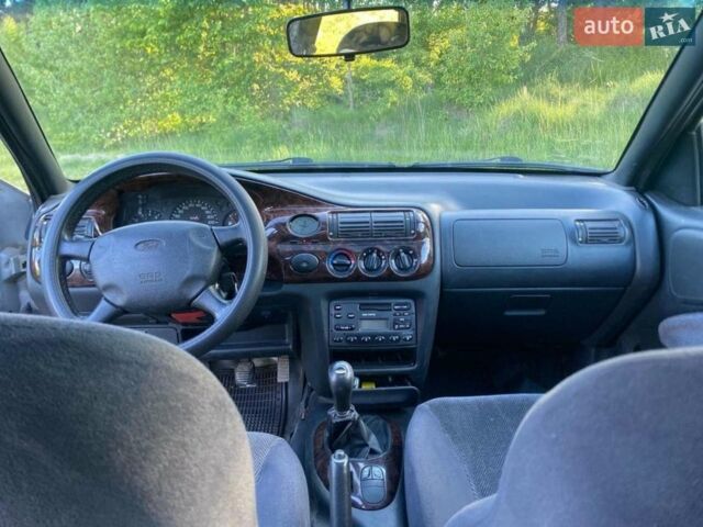 Сірий Форд Ескорт, об'ємом двигуна 1.4 л та пробігом 320 тис. км за 1450 $, фото 7 на Automoto.ua