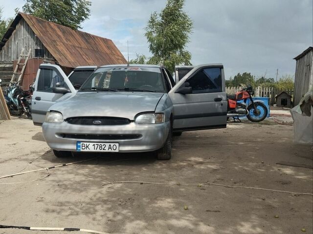Серый Форд Эскорт, объемом двигателя 1.8 л и пробегом 239 тыс. км за 1250 $, фото 2 на Automoto.ua