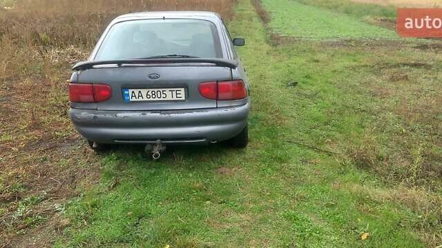 Серый Форд Эскорт, объемом двигателя 1.3 л и пробегом 1114 тыс. км за 1800 $, фото 1 на Automoto.ua
