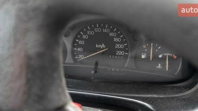 Серый Форд Эскорт, объемом двигателя 1.3 л и пробегом 1114 тыс. км за 1800 $, фото 2 на Automoto.ua