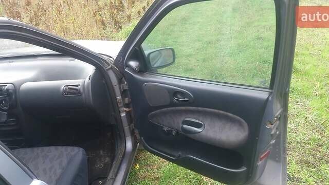 Серый Форд Эскорт, объемом двигателя 1.3 л и пробегом 1114 тыс. км за 1800 $, фото 3 на Automoto.ua