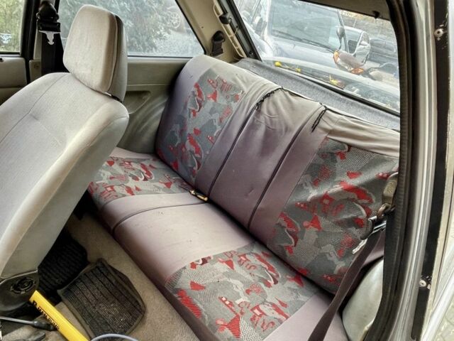 Серый Форд Эскорт, объемом двигателя 1.3 л и пробегом 300 тыс. км за 680 $, фото 4 на Automoto.ua