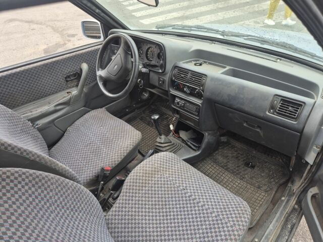 Серый Форд Эскорт, объемом двигателя 1.3 л и пробегом 169 тыс. км за 900 $, фото 2 на Automoto.ua