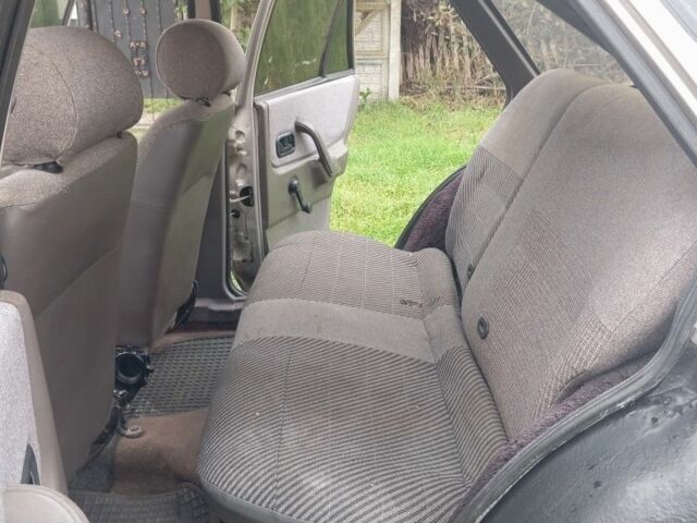 Сірий Форд Ескорт, об'ємом двигуна 1.4 л та пробігом 300 тис. км за 475 $, фото 4 на Automoto.ua