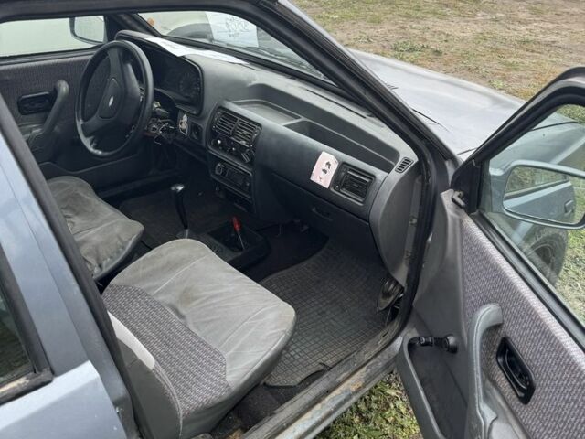 Серый Форд Эскорт, объемом двигателя 1.4 л и пробегом 2 тыс. км за 312 $, фото 2 на Automoto.ua